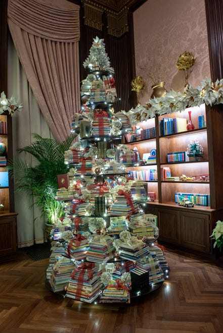 This tree of stacked children's books will be donated after A Longwood Christmas ends Jan. 6.