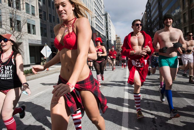 People run in "Cupid's Undie Run" in Washington, D.C. The annual event expands to 40 cities in February, including at The Queen in Wilmington. 
Participants run in their Valentine's-themed underwear, raising funds for the Children's Tumor Foundation.
