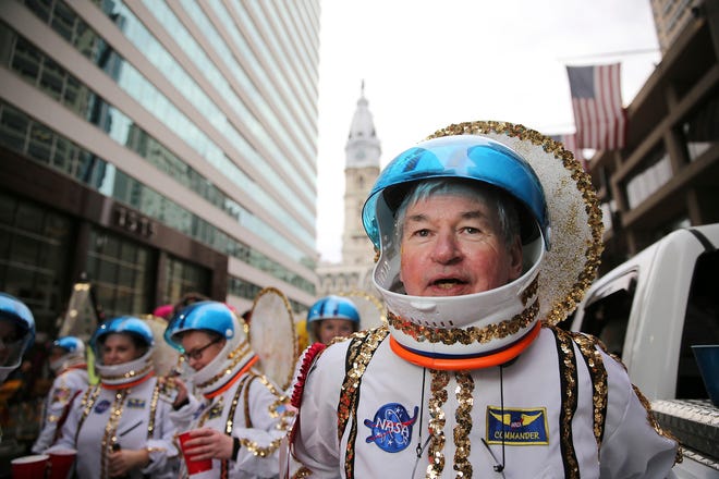 Harry Dougherty, of the Golden Sunrise Fancy Brigade, waits on the 1500 block of Market Street for the start of the Mummers Parade, Tuesday, Jan. 1, 2019, in Philadelphia. (David Maialetti/The Philadelphia Inquirer via AP)