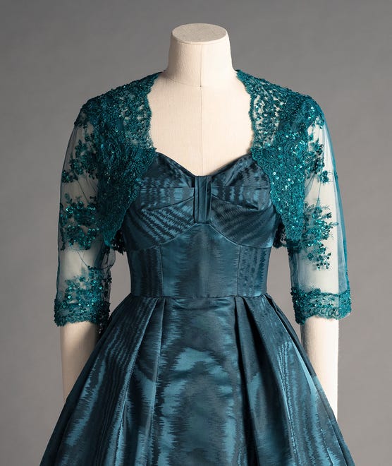 This Michele Clapton dress replicates one worn by Queen Elizabeth to a private dinner.