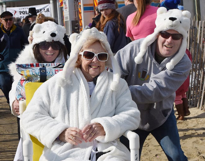 Warmer temperatures had over 3000 "Bears" making the jump into the Atlantic Ocean on Sunday for the Annual Lewes Polar Bear Plunge for Special Olympics Delaware on the beach at Rehoboth Beach. 
Special to the News Journal / CHUCK SNYDER