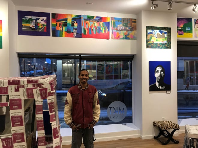 Geraldo Gonzalez, who is fascinated by buses and transportation, has an exhibit of his work on Market Street in Wilmington.