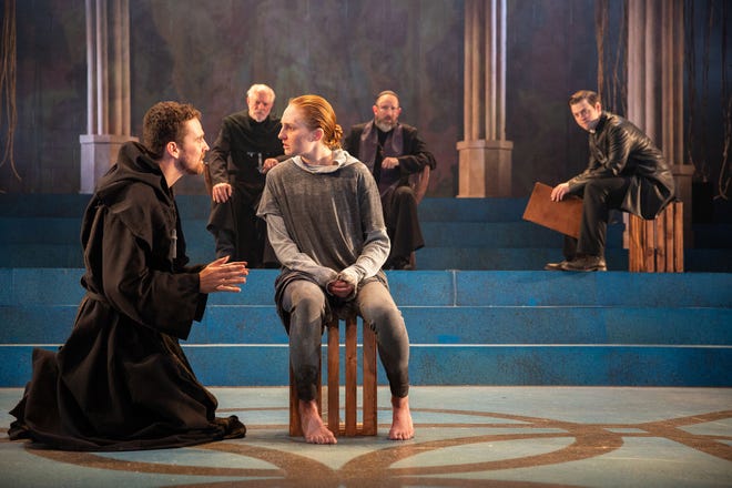 Clare O'Malley, center, stars at "St. Joan" at Delaware Theatre Company with, from left, Sean Michael Bradley, Dan Kern, Charlie DelMarcelle and Michael Doherty.