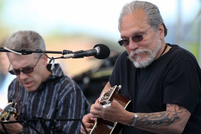 Jorma Kaukonen (right), founding member of Jefferson Airplane and member of Hot Tuna, performs at Bromberg's Big Noise in 2010.