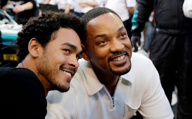 Will Smith (right) and his son Trey visit the pit lane during the Abu Dhabi Formula One Grand Prix on Nov. 25, 2018, in Abu Dhabi, United Arab Emirates.