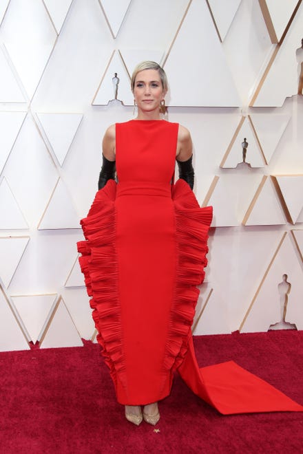 There are unusual silhouettes, and then there ' s this. Things Kristen Wiig ' s 2020 dress was compared to on social media: lasagna, cuttlefish and toilet brushes.