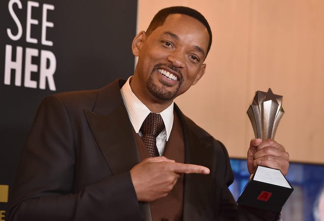 Will Smith poses in the press room with the award for best actor for " King Richard " at the 27th annual Critics Choice Awards on March 13, 2022.