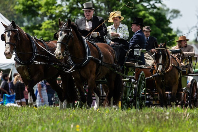 Antique carriages are featured during the George A. “Frolic” Weymouth Antique Carriage Parade at the 45th annual Point-to-Point in Winterthur on Sunday, May 7, 2023. Proceeds from this year's event support environmental and landscape stewardship initiatives.