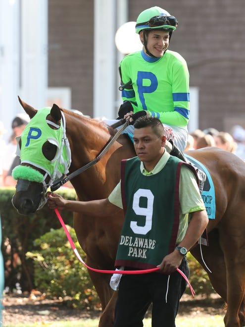 Jose Bracho gets settled on Fuhriously Kissed before the $750,000 Delaware Handicap Saturday at Delaware Park.