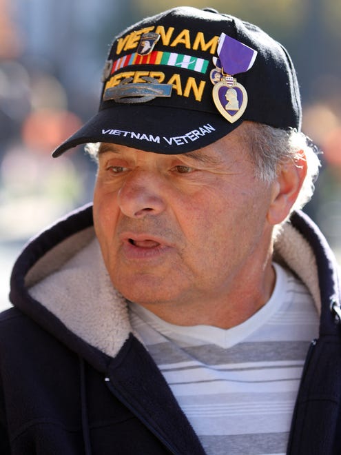 Vietnam era Army veteran Lou Delgiudice, Lacey Township, is interviewed along the Toms River Veterans Day parade route Monday, November 14, 2016.