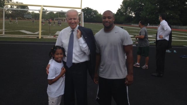 Archmere Academy football coach Omar Richardson and his daughter Autumn with Vice President Joe Biden.