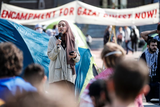 April 22, 2024: On the University of Michigan campus in Ann Arbor, Mich., Salma Hamamy, president of U-M SAFE, which stands for Students Allied for Freedom and Equality, speaks at a rally at an encampment in the Diag to pressure the university to divest its endowment from companies that support Israel or could profit from the ongoing conflict between Israel and the Palestinian militant group Hamas.