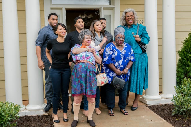 From left to right: Courtney Burrell, KJ Smith, Rome Flynn, Patrice Lovely, Ciera Payton), David Otunga, Cassi Davis and Tyler Perry in "A Madea Family Funeral."