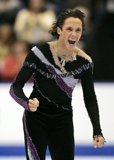 Two-time U.S. figure skating champion Johnny Weir reacts after his performance in the men's free skate event at the U.S. Figure Skating Championships in St. Louis, Saturday, Jan. 14, 2006. Weir finished first in the competition and earned a spot on the U.S. Olympic team going to Turin.