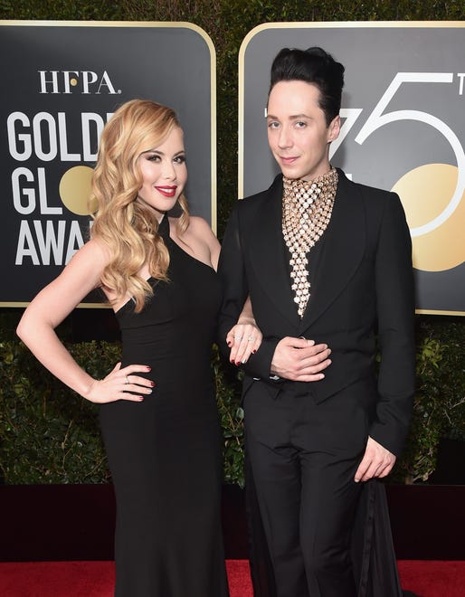 Figure skaters Tara Lipinski and Johnny Weir attend The 75th Annual Golden Globe Awards at The Beverly Hilton Hotel on January 7, 2018 in Beverly Hills, California.