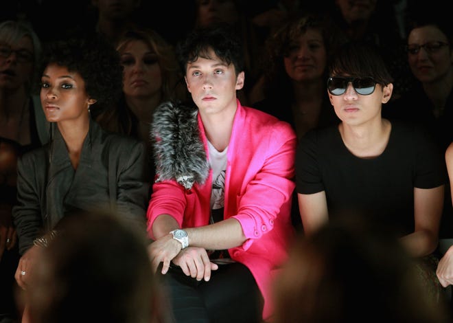 Actress Yaya DaCosta, figure skater Johnny Weir and blogger Bryan Boy attend the Isaac Mizrahi Spring 2011 fashion show during Mercedes-Benz Fashion Week at The Theater at Lincoln Center on September 16, 2010 in New York City.