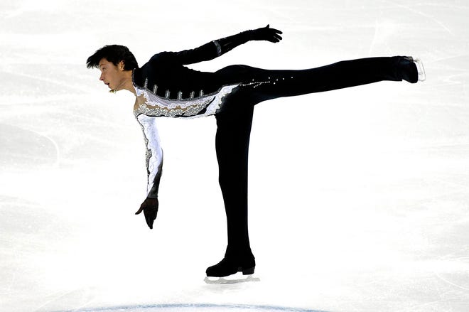 Johnny Weir of the United States, performs during the Ice Men short program of the Figure Skating final 2007 at the Palavela in Turin, Italy, Friday, Dec. 14, 2007.
