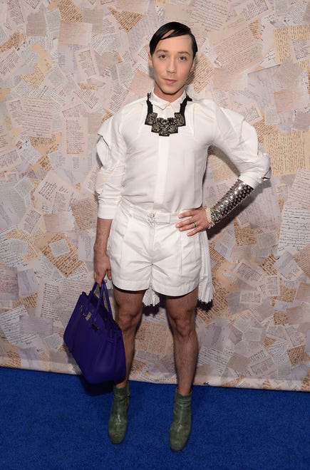 American figure skater Johnny Weir attends the alice + olivia by Stacey Bendet presentation during Mercedes-Benz Fashion Week Spring 2014 on September 9, 2013 in New York City.