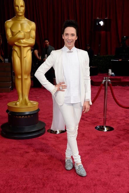 Johnny Weir arrives at the Oscars on Sunday, March 2, 2014, at the Dolby Theatre in Los Angeles.