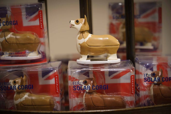Solar head bobble corgies are among the royal- and British-themed items in the gift shop at the end of Winterthur Museum's 'Costuming The Crown' exhibit.