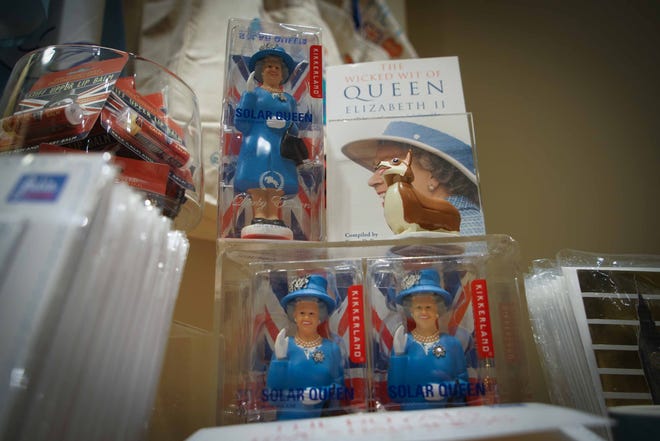 Want your own solar-activated waving Queen? Snap one up in the gift shop at  Winterthur Museum's 'Costuming The Crown' exhibit.