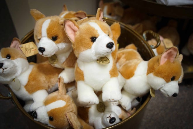 A barrel of corgies are some of the many royal- and British-themed googies on sale in the 'Costuming the Crown
 gift shop at Winterthur Museum.