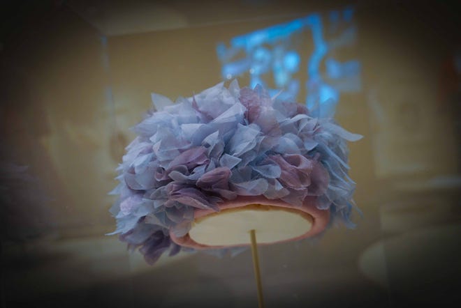 A hat worn by the Queen Mother in 'The Crown' is among the 40 outfits on display in Winterthur Museum's 'Costuming The Crown' exhibit.