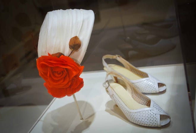 The queen's hat and shoes are among the items on display in Winterthur Museum's 'Costuming The Crown' exhibit.