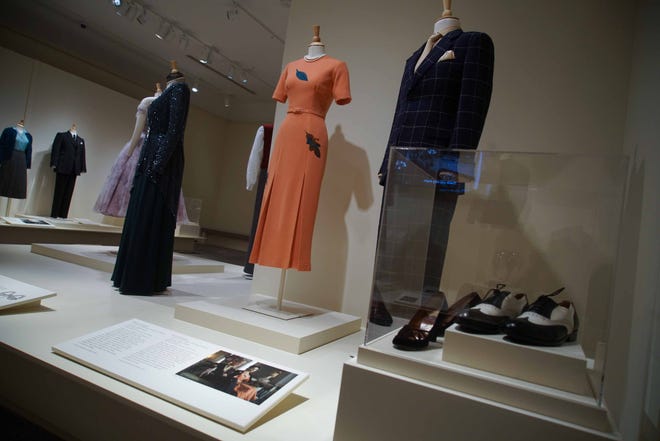The windowpane suit created for the Duke of Windsor and a peach dress for his wife are among the items in Winterthur Museum's 'Costuming The Crown' exhibit.