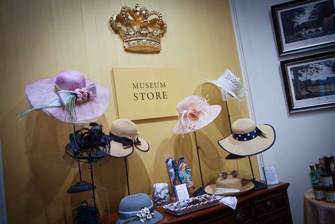 The 'Costuming The Crown' museum store includes hats, a ton of corgie products, tea and more at Winterthur Museum.