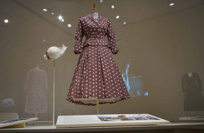 A copy of the dress Elizabeth wore on a trip to Africa before she became queen is among the clothes in Winterthur Museum's 'Costuming The Crown' exhibit.
