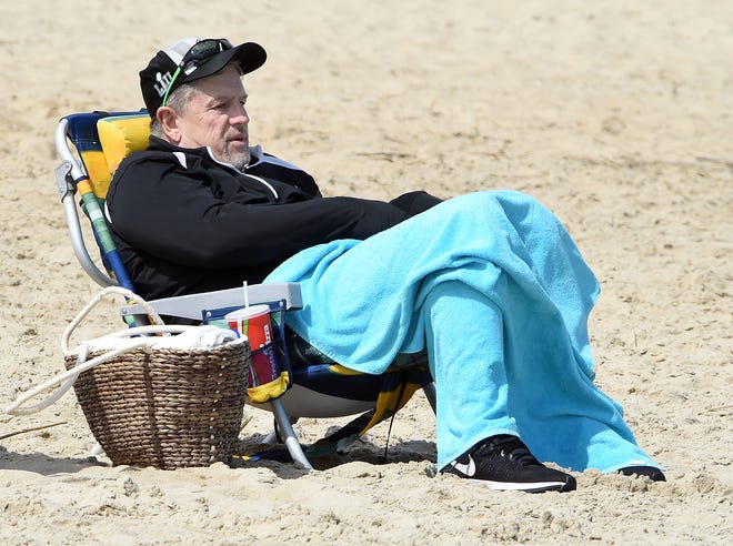 Nice, albeit chilly, weather brought out the beach fans and traffic in Rehoboth on Saturday. Visitors walked the boardwalk and beach and enjoyed ice cream and french fries.