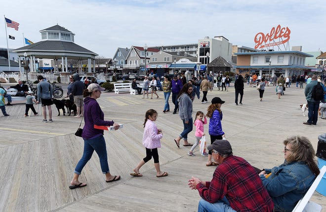 Nice, albeit chilly, weather brought out the beach fans and traffic in Rehoboth on Saturday. Visitors walked the boardwalk and beach and enjoyed ice cream and french fries.