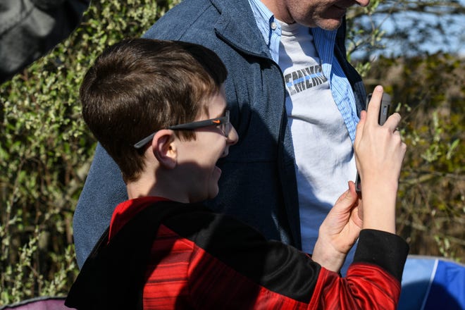 11-year-old Elijah Goodwin watches NG-11 rocket launch from the at the lawn in front of the NASA Wallops Island visitor's center on Wednesday, April 17, 2019. "It was incredible," he said shortly after.