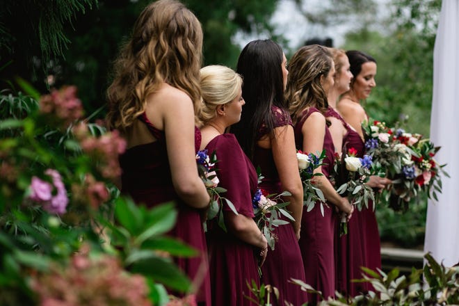Deep purples, reds and blues are replacing muted wedding color palettes.